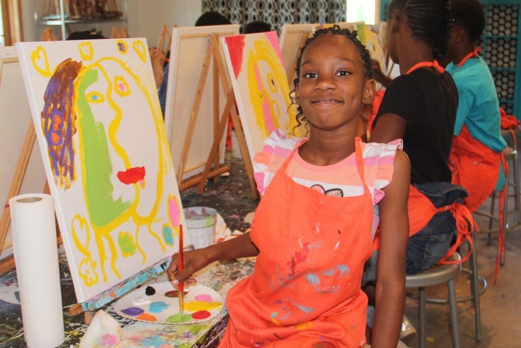 Children painting in art class